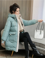 Women's Insulated Hooded Winter Jacket - Warm Long Outerwear for Cold Weather - Stylish and Functional Design